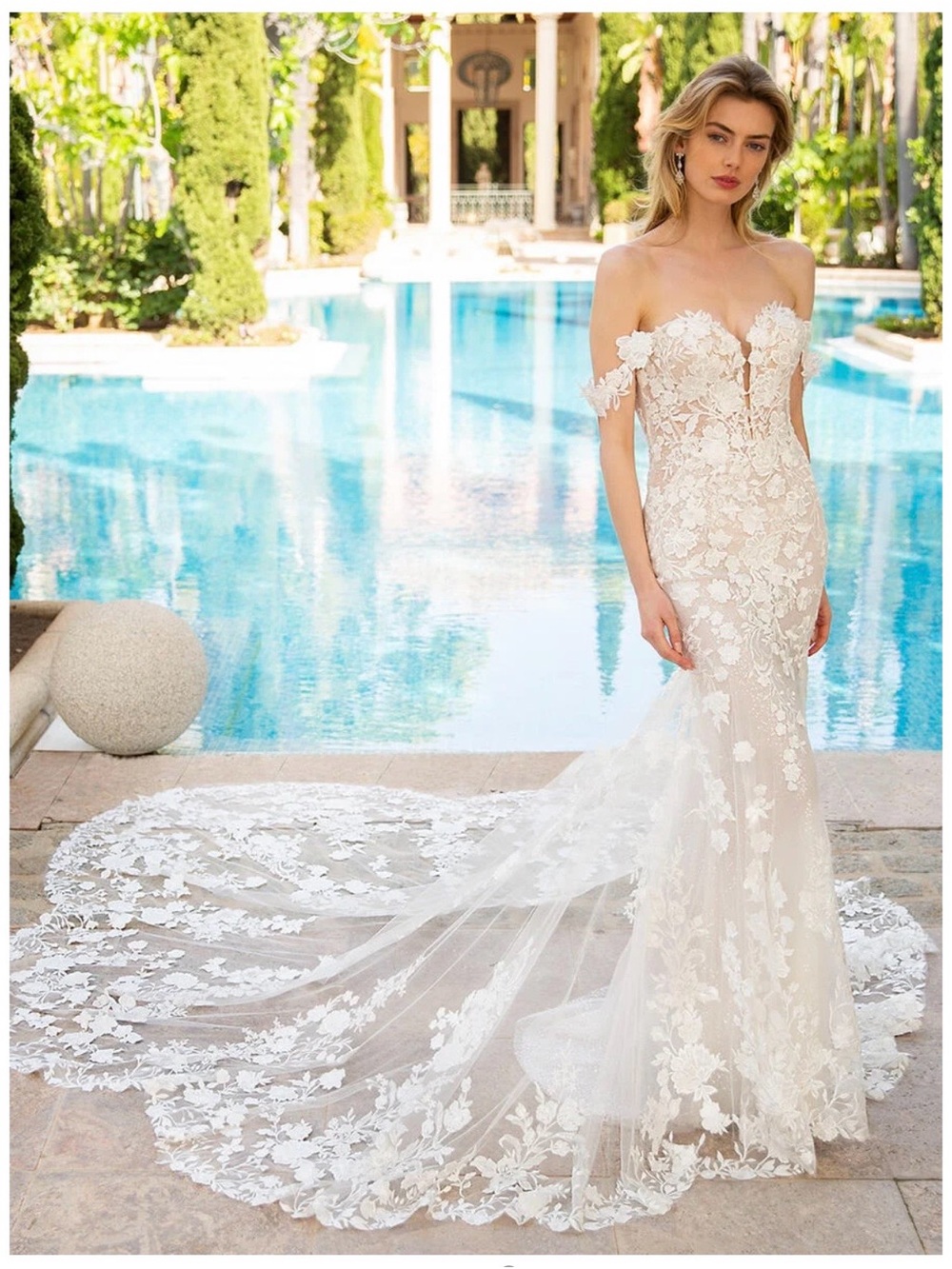 Elegant ENZOANI Off-Shoulder Lace Bridal Gown in Ivory